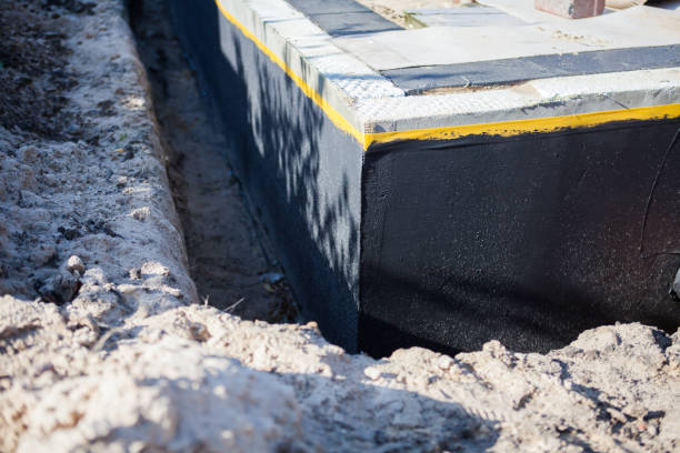 Professional Interior Drainage System technician working in Coloma, WI